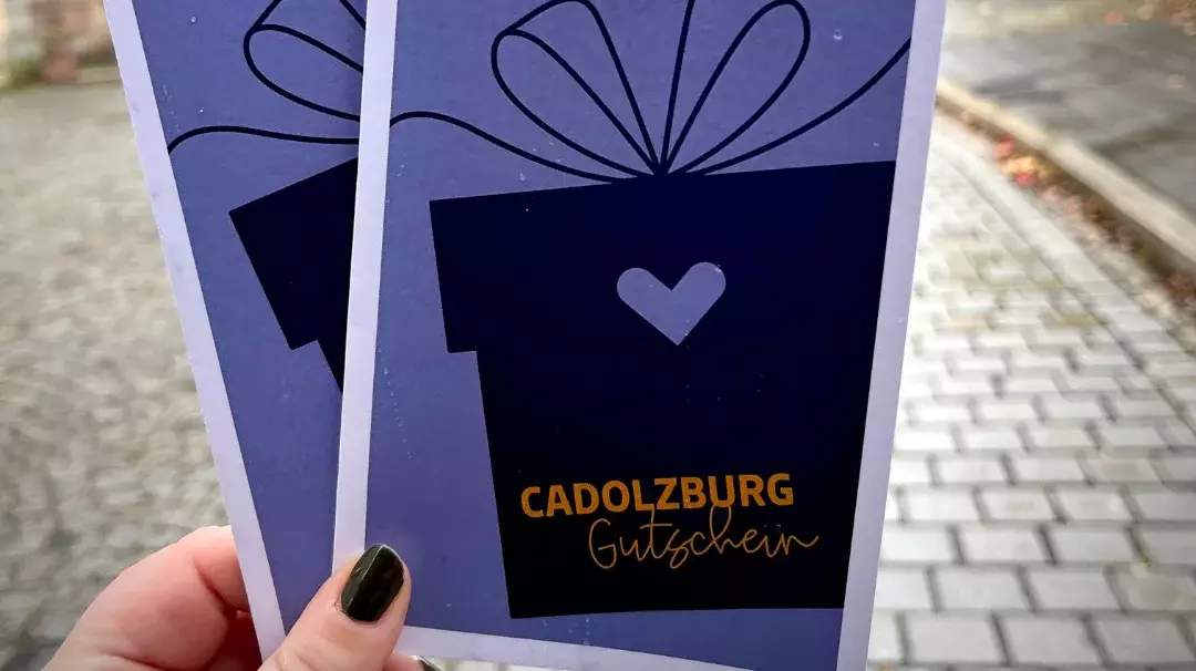 der Cadolzburg-Gutschein mit Cadolzburg im Hintergrund